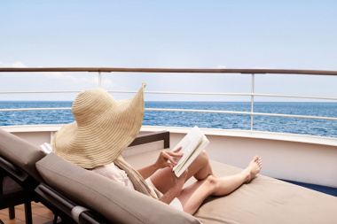 silversea-luxury-cruises-silver-muse-pool-deck-woman-sunbed